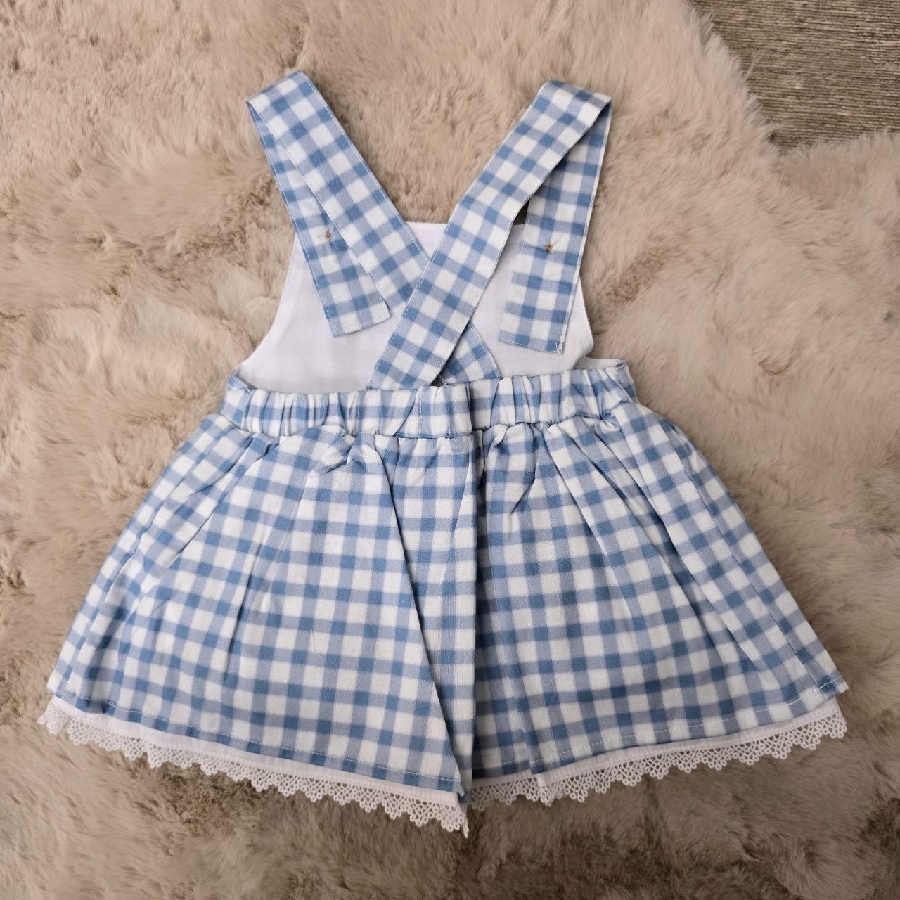 Salopette per neonata blu con quadretti