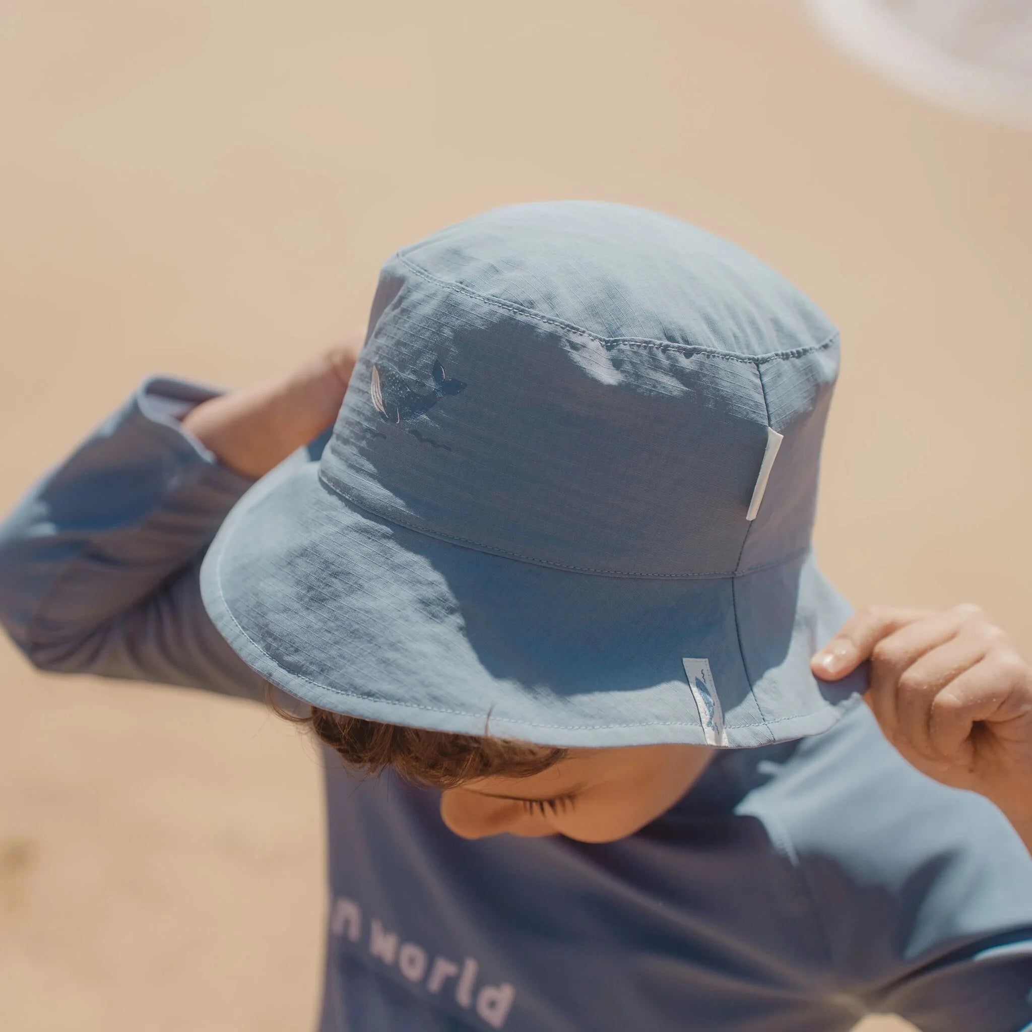 Cappello da spiaggia reversibile Ocean Blue - Little Dutch