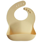 Bavetta in silicone Mushie — Sunshine
